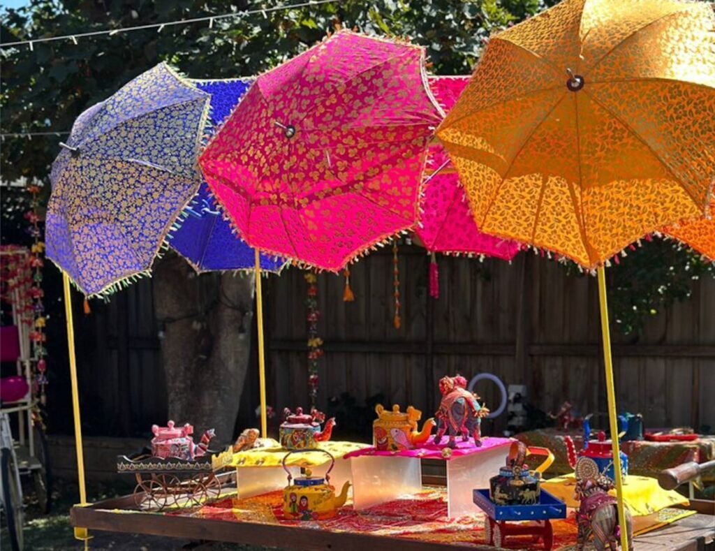 mehndi decorations umbrellas tea station in melbourne by G Luxe Events